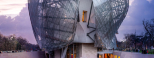 HDR picture of the Louis Vuitton Foundation building in Paris with beautiful sky and reflection